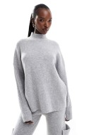 knit high neck jumper and trouser co-ord in light grey